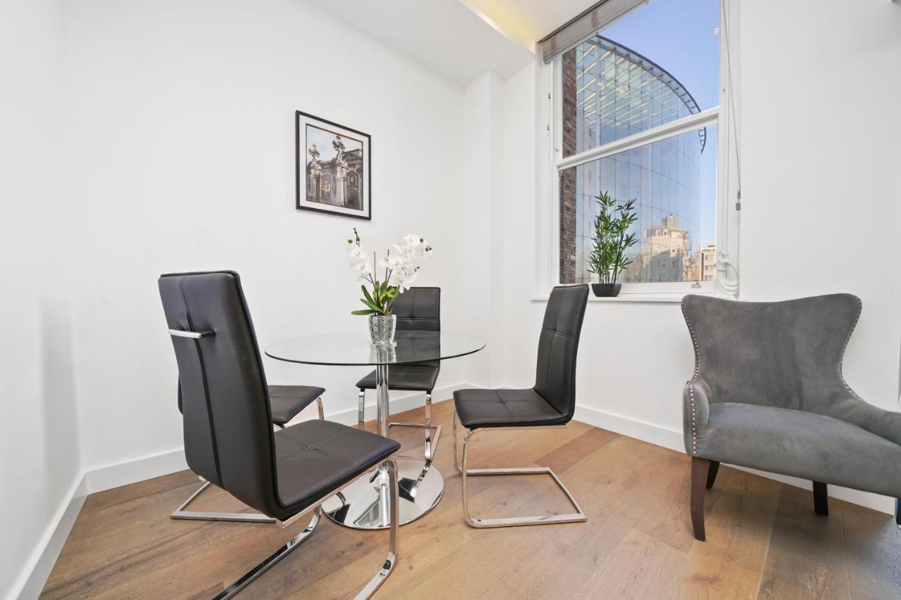 City Prime Apartments London Exterior foto A staged photo of a dining room